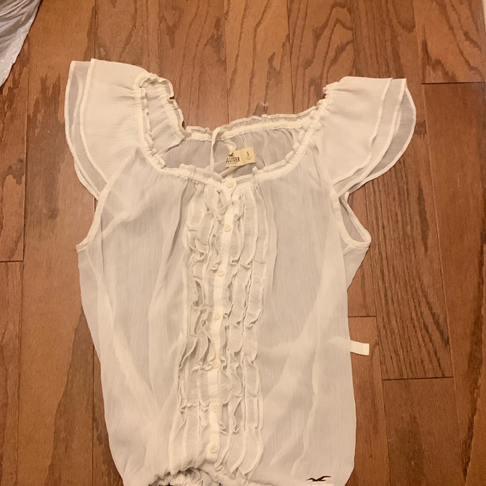 only wore once, cute shirt that goes with anything
